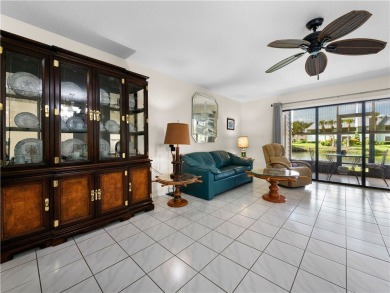 First floor unit with a lake view. 42* kitchen cabinets, granite on Pelican Pointe 9 Hole Course in Florida - for sale on GolfHomes.com, golf home, golf lot