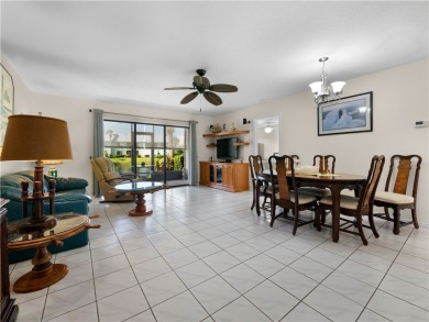 First floor unit with a lake view. 42* kitchen cabinets, granite on Pelican Pointe 9 Hole Course in Florida - for sale on GolfHomes.com, golf home, golf lot