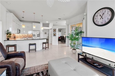 EXQUISITE TURNKEY GOLF-FRONT RESIDENCE IN WORTHINGTON COUNTRY on Worthington Country Club in Florida - for sale on GolfHomes.com, golf home, golf lot