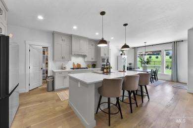 Step into refined elegance with this stunning residence in on Hunters Point Golf Club in Idaho - for sale on GolfHomes.com, golf home, golf lot