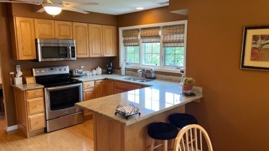Move-in ready 2nd floor condo in the highly sought-after on Oak Hills Country Club in Illinois - for sale on GolfHomes.com, golf home, golf lot
