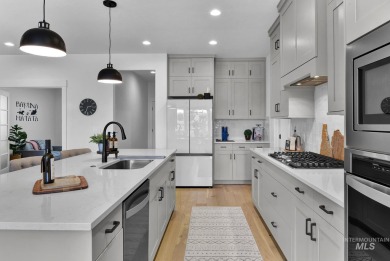 Step into refined elegance with this stunning residence in on Hunters Point Golf Club in Idaho - for sale on GolfHomes.com, golf home, golf lot