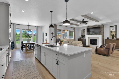 Step into refined elegance with this stunning residence in on Hunters Point Golf Club in Idaho - for sale on GolfHomes.com, golf home, golf lot