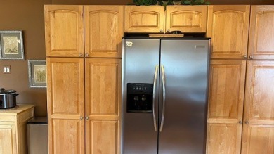 Move-in ready 2nd floor condo in the highly sought-after on Oak Hills Country Club in Illinois - for sale on GolfHomes.com, golf home, golf lot