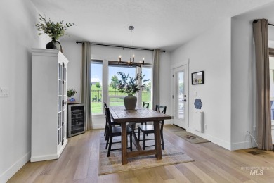 Step into refined elegance with this stunning residence in on Hunters Point Golf Club in Idaho - for sale on GolfHomes.com, golf home, golf lot