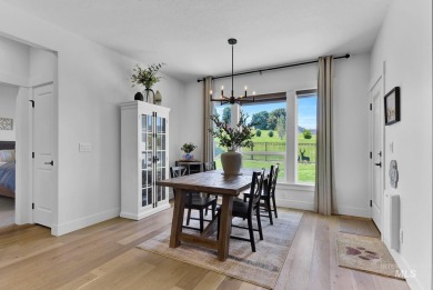 Step into refined elegance with this stunning residence in on Hunters Point Golf Club in Idaho - for sale on GolfHomes.com, golf home, golf lot