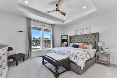 Step into refined elegance with this stunning residence in on Hunters Point Golf Club in Idaho - for sale on GolfHomes.com, golf home, golf lot