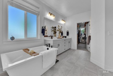 Step into refined elegance with this stunning residence in on Hunters Point Golf Club in Idaho - for sale on GolfHomes.com, golf home, golf lot