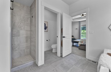 Step into refined elegance with this stunning residence in on Hunters Point Golf Club in Idaho - for sale on GolfHomes.com, golf home, golf lot