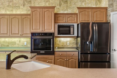 Welcome to refined Florida living in the heart of Calusa Lakes on Calusa Lakes Golf Club in Florida - for sale on GolfHomes.com, golf home, golf lot