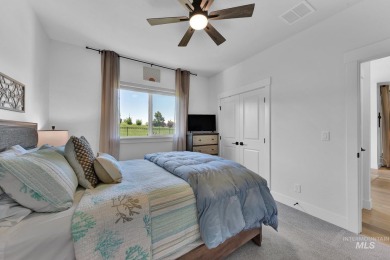 Step into refined elegance with this stunning residence in on Hunters Point Golf Club in Idaho - for sale on GolfHomes.com, golf home, golf lot