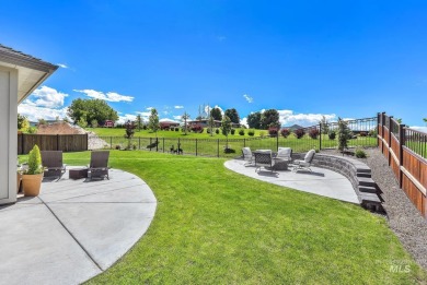 Step into refined elegance with this stunning residence in on Hunters Point Golf Club in Idaho - for sale on GolfHomes.com, golf home, golf lot