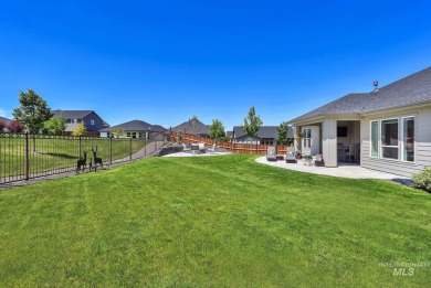 Step into refined elegance with this stunning residence in on Hunters Point Golf Club in Idaho - for sale on GolfHomes.com, golf home, golf lot