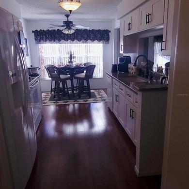 Maintenance free living. This two-bedroom, two-bath villa with a on Timber Greens Country Club in Florida - for sale on GolfHomes.com, golf home, golf lot