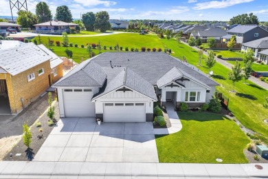 Step into refined elegance with this stunning residence in on Hunters Point Golf Club in Idaho - for sale on GolfHomes.com, golf home, golf lot