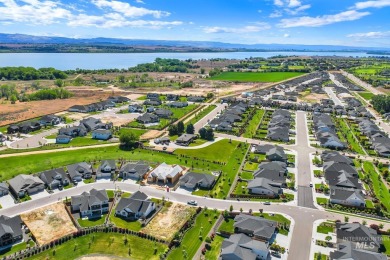 Step into refined elegance with this stunning residence in on Hunters Point Golf Club in Idaho - for sale on GolfHomes.com, golf home, golf lot