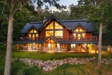 Welcome to this stunning Up North luxury log home perfectly on Boyne Mountain Resort - Monument Course in Michigan - for sale on GolfHomes.com, golf home, golf lot