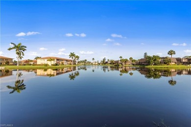 This attractive second-floor condo has stunning lake views from on Riviera Golf Club in Florida - for sale on GolfHomes.com, golf home, golf lot