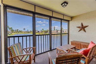 This attractive second-floor condo has stunning lake views from on Riviera Golf Club in Florida - for sale on GolfHomes.com, golf home, golf lot