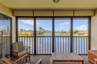 This attractive second-floor condo has stunning lake views from on Riviera Golf Club in Florida - for sale on GolfHomes.com, golf home, golf lot