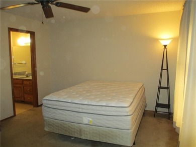 A place to stay and a place to play.  This condo offers either on Holiday Island Executive Golf Course in Arkansas - for sale on GolfHomes.com, golf home, golf lot