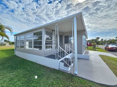 HUGE INCENTIVE, ALL LOT RENT WILL BE PAID THRU THE END OF THE on Riverbend Golf and Country Club in Florida - for sale on GolfHomes.com, golf home, golf lot
