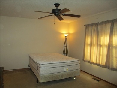 A place to stay and a place to play.  This condo offers either on Holiday Island Executive Golf Course in Arkansas - for sale on GolfHomes.com, golf home, golf lot