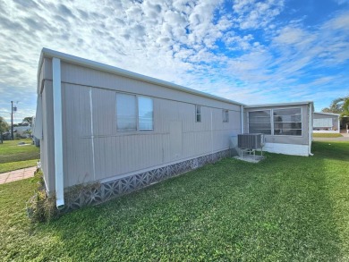 HUGE INCENTIVE, ALL LOT RENT WILL BE PAID THRU THE END OF THE on Riverbend Golf and Country Club in Florida - for sale on GolfHomes.com, golf home, golf lot