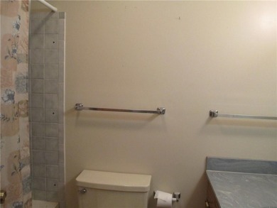 A place to stay and a place to play.  This condo offers either on Holiday Island Executive Golf Course in Arkansas - for sale on GolfHomes.com, golf home, golf lot