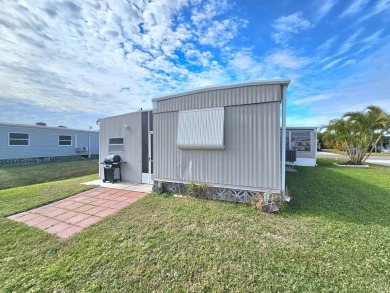 HUGE INCENTIVE, ALL LOT RENT WILL BE PAID THRU THE END OF THE on Riverbend Golf and Country Club in Florida - for sale on GolfHomes.com, golf home, golf lot