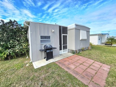 HUGE INCENTIVE, ALL LOT RENT WILL BE PAID THRU THE END OF THE on Riverbend Golf and Country Club in Florida - for sale on GolfHomes.com, golf home, golf lot