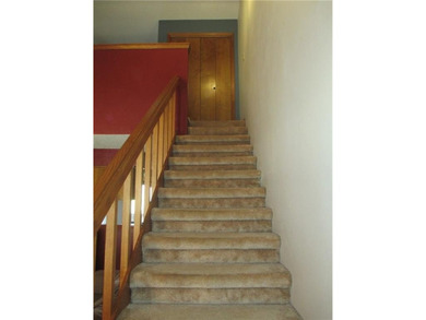 A place to stay and a place to play.  This condo offers either on Holiday Island Executive Golf Course in Arkansas - for sale on GolfHomes.com, golf home, golf lot