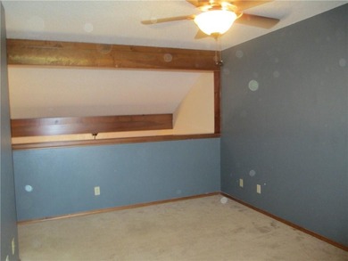 A place to stay and a place to play.  This condo offers either on Holiday Island Executive Golf Course in Arkansas - for sale on GolfHomes.com, golf home, golf lot