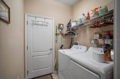 Welcome to 29405 Cochiti Lake Drive, located in the gated 55+ on Tampa Bay Golf and Country Club in Florida - for sale on GolfHomes.com, golf home, golf lot