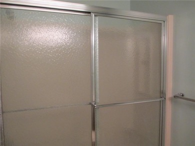 A place to stay and a place to play.  This condo offers either on Holiday Island Executive Golf Course in Arkansas - for sale on GolfHomes.com, golf home, golf lot