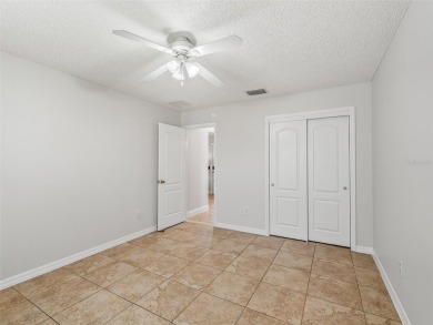 EXPANDED BANYAN MODEL w/ GOLF CART in the VILLAGE OF PIEDMONT! on The Links of Spruce Creek in Florida - for sale on GolfHomes.com, golf home, golf lot