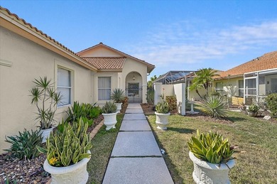 Three bedrooms, a private pool, and lake and golf course on Peridia Golf and Country Club in Florida - for sale on GolfHomes.com, golf home, golf lot