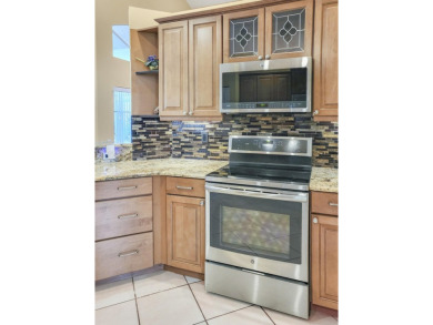 WOW! Roof Installed Nov 2021! This well maintained 2 Bed + den on Westchester Golf and Country Club in Florida - for sale on GolfHomes.com, golf home, golf lot