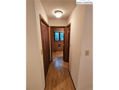 Welcome to this 3-bedroom, 3-bath mountain home with bonus room on Beech Mountain Club in North Carolina - for sale on GolfHomes.com, golf home, golf lot