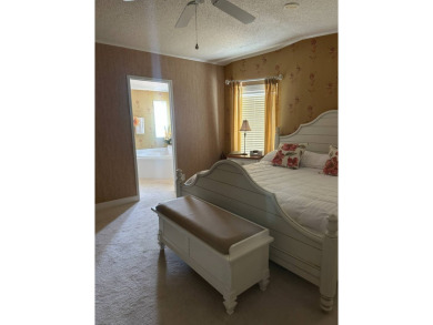 Discover Golf Course Perfection: Fully Furnished 2-Bedroom Palm on Schalamar Creek Golf and Country Club in Florida - for sale on GolfHomes.com, golf home, golf lot