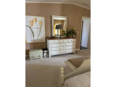 Discover Golf Course Perfection: Fully Furnished 2-Bedroom Palm on Schalamar Creek Golf and Country Club in Florida - for sale on GolfHomes.com, golf home, golf lot