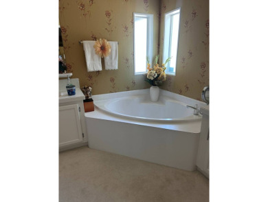 Discover Golf Course Perfection: Fully Furnished 2-Bedroom Palm on Schalamar Creek Golf and Country Club in Florida - for sale on GolfHomes.com, golf home, golf lot