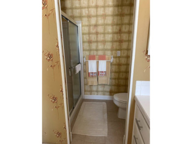 Discover Golf Course Perfection: Fully Furnished 2-Bedroom Palm on Schalamar Creek Golf and Country Club in Florida - for sale on GolfHomes.com, golf home, golf lot
