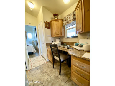 A newer, larger park model on the fairway? Yes! This 2019 park on Juniper Ridge R.V. Golf Resort in Arizona - for sale on GolfHomes.com, golf home, golf lot