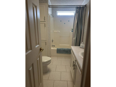 Discover Golf Course Perfection: Fully Furnished 2-Bedroom Palm on Schalamar Creek Golf and Country Club in Florida - for sale on GolfHomes.com, golf home, golf lot