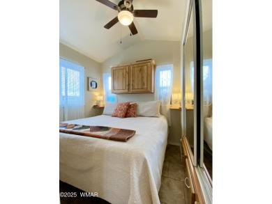 A newer, larger park model on the fairway? Yes! This 2019 park on Juniper Ridge R.V. Golf Resort in Arizona - for sale on GolfHomes.com, golf home, golf lot