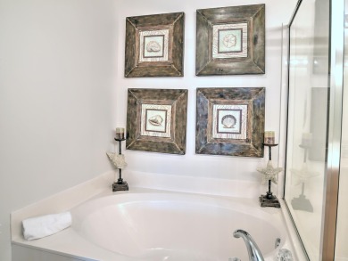 PRICE ADJUSTMENT.This fully-furnished and move-in ready unit on Seascape Golf Course in Florida - for sale on GolfHomes.com, golf home, golf lot