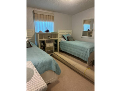 Discover Golf Course Perfection: Fully Furnished 2-Bedroom Palm on Schalamar Creek Golf and Country Club in Florida - for sale on GolfHomes.com, golf home, golf lot