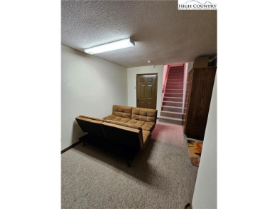 Welcome to this 3-bedroom, 3-bath mountain home with bonus room on Beech Mountain Club in North Carolina - for sale on GolfHomes.com, golf home, golf lot