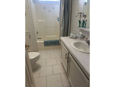 Discover Golf Course Perfection: Fully Furnished 2-Bedroom Palm on Schalamar Creek Golf and Country Club in Florida - for sale on GolfHomes.com, golf home, golf lot